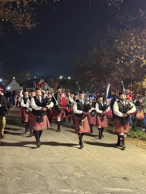 Pipe band marching at Christmas in Winter